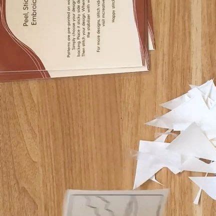 The Paper Is Cut Out And Placed On The Table To Make A Christmas Tree