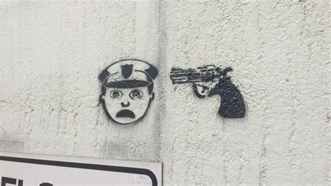 Disturbing graffiti with gun and officer emojis pops up around Houston - ABC13 Houston