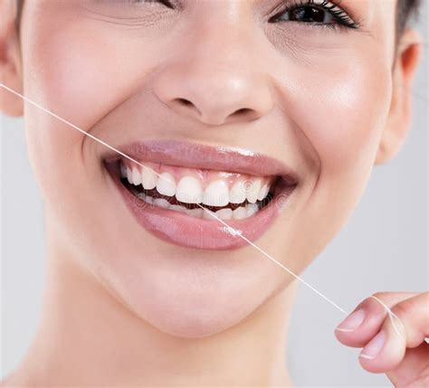 Happy Woman Portrait And Closeup With Dental Floss For Teeth Cleaning