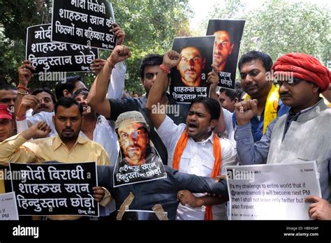 Hindu Sena Saffron Wearing Men Carrying Posters Protesting Shouting