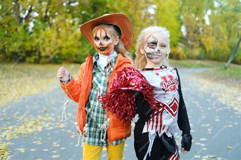 Premium Photo A Girl In A Cheerleader Costume With Halfface Skeleton