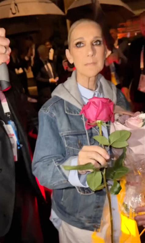 Céline Dion Gets Flowers After Stella Paris Olympics Performance