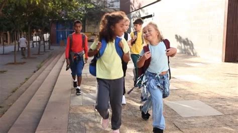 Group of children with backpacks walking... | Stock Video | Pond5