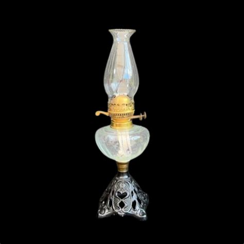 A Black Patinated Cast Brass Patterned Oil Lamp Base With Clear Swirl