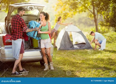 Young Friends Just Came To Camping Trip Stock Image - Image of people ...