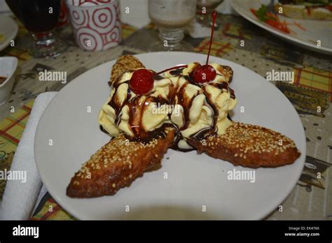 Fried banana and ice cream thai dessert Stock Photo - Alamy