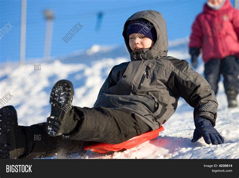 Fun High Speed Sledding Image & Photo | Bigstock