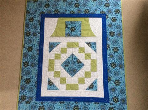 Lap Quilt With Pockets