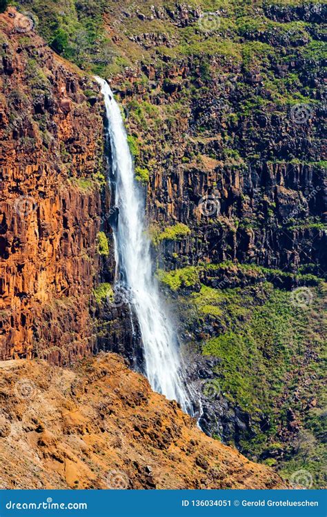 View Of The Waterfall In The Waimea Canyon In Kauai Hawaii Islands