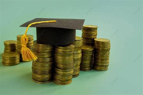 Education Savings Idea Money And Graduation Cap Together Photo