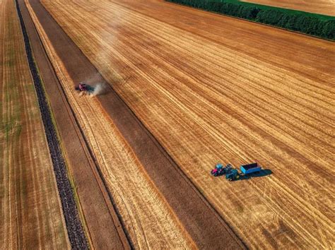 Aerial View Of Combine Harvester Agriculture Machine Harvesting Stock