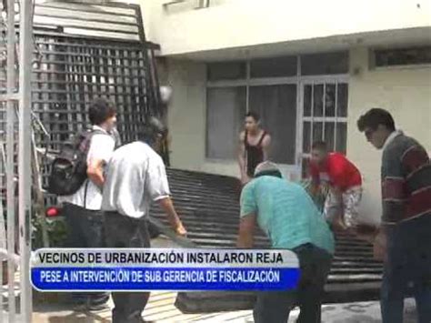 VECINOS Y MUNICIPALES SE ENFRENTAN POR LA COLOCACION DE UNA REJA EN