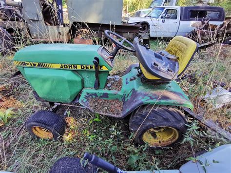 JOHN DEERE TRACTOR, AND MOWER DECK - EG Auctions