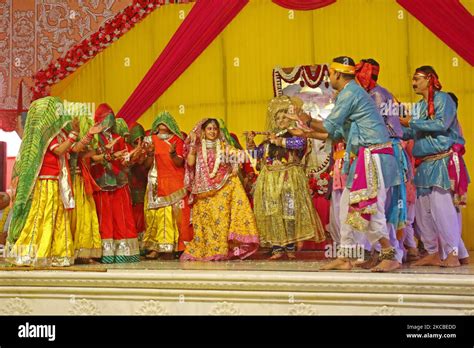 Artists Perform Lathmar Holi During The Holi Utsav Celebration At