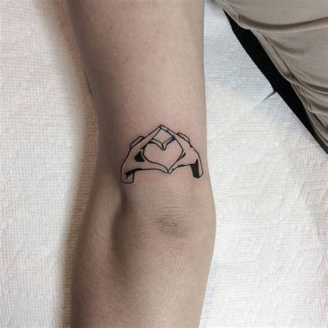 Heart shaped hands tattoo. Design by Frédéric in 2023 | Shape tattoo ...