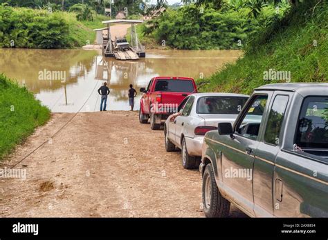 Hand Cranked Cable Ferry Crossing Belize River On Road To Spanish