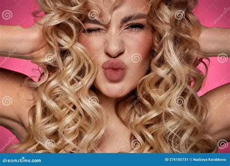 Blondie Girl With Long And Shiny Curly Hair Beautiful Model Woman With Wavy Hairstyle Stock