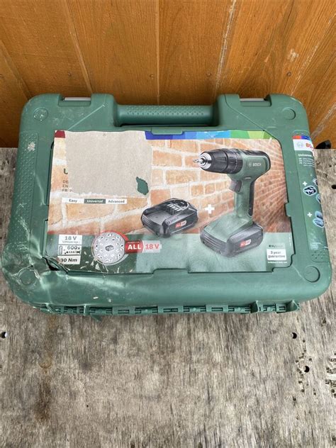 Bosch Universal Impact 18v Cordless Drill 2 Batteries Read Description