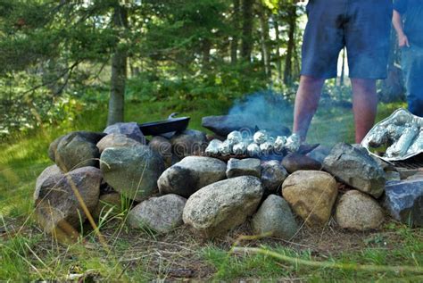 Cooking Corn on the Cob Over a Camp Fire Stock Photo - Image of ...