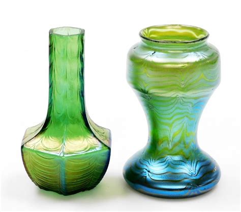 A Loetz Green Iridescent Glass Vase Of Feathered Baluster Form 12cm