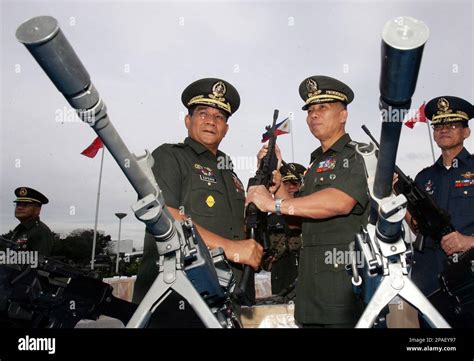 Philippine Armed Forces Chief Gen Hermogenes Esperon Jr Left Hands