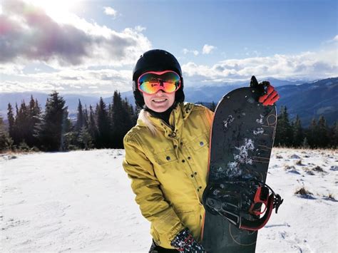 Premium Photo A Person Standing On A Snow Covered Slope