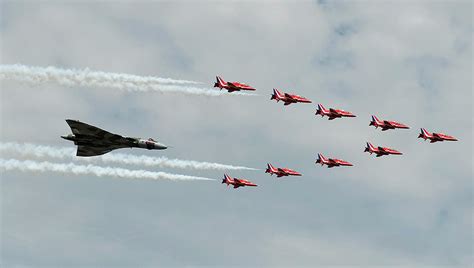 The Royal Air Force Red Arrow Display Photograph by Kieran Doherty - Pixels