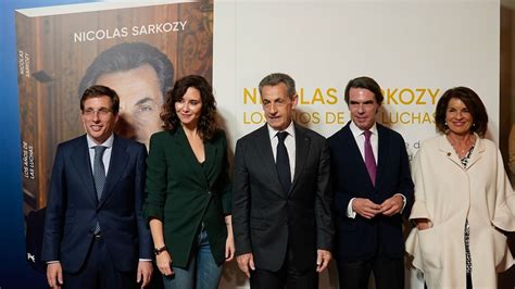 Ayuso y Almeida arropan a Nicolas Sarkozy en la presentación de su