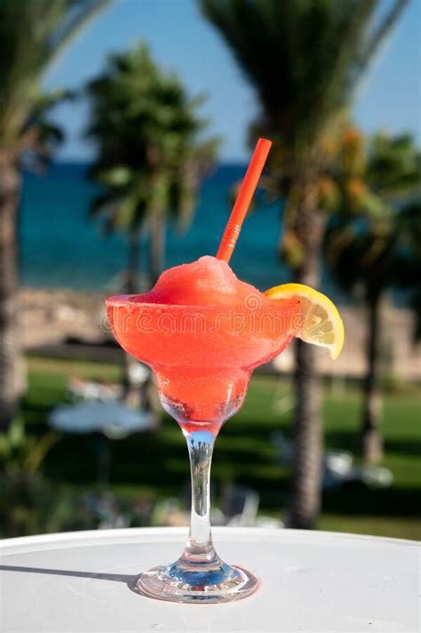 Colourful Cold Strawberry Daiquiri Cocktail Drink Served In Glass At