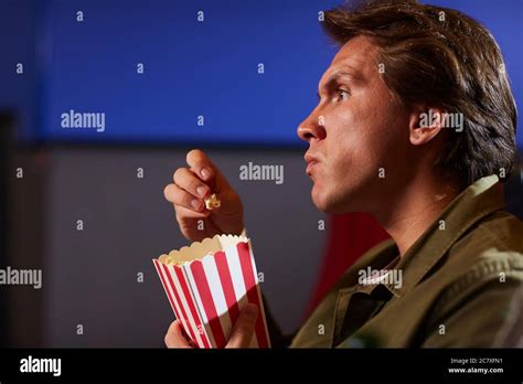 Man Eating Popcorn Hi Res Stock Photography And Images Alamy