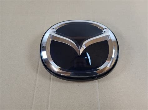 MAZDA 2 II CX 60 CX60 CX 80 CX80 EMBLEMAT LOGO POD RADAR PODSTAWA