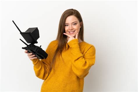 Chica Adolescente Sosteniendo Un Control Remoto De Drone Sobre Fondo