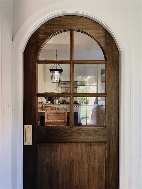 All The Details On Our Faux Arched Pocket Door We Re The Whites