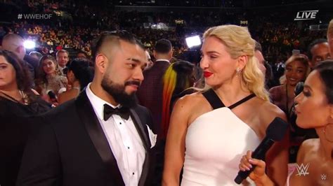 Charlotte Flair and Andrade Confirm Relationship During Hall Of Fame Carpet