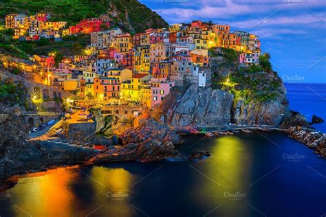 Manarola Village And Harbor At Night Places To Visit Places To