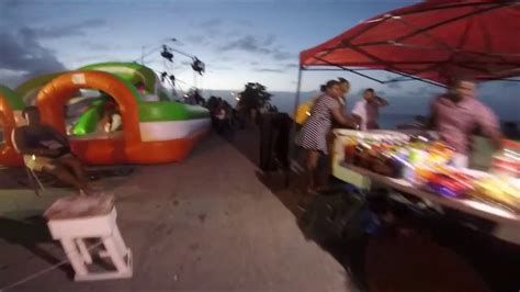 Walking Along The Georgetown Guyana Seawall After Sunset And On Beach