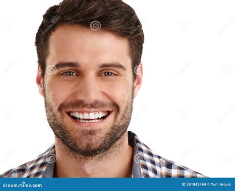 Happy And Handsome Studio Portrait Of A Handsome Young Man Smiling