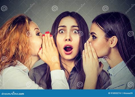 Women Telling A Secret