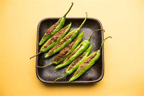 Premium Photo Bharwa Masala Mirch Or Stuffed Green Chillies Or Bharli