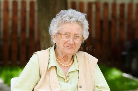 Face Of Content Beautiful Old Senior Woman Stock Photo Image Of Adult