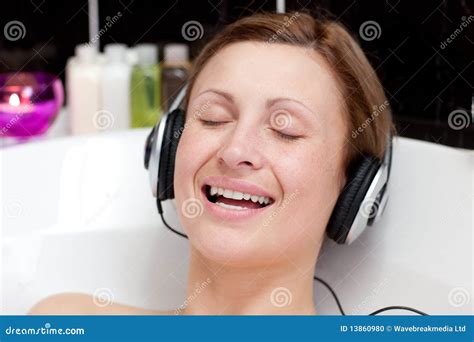 Woman Listening Music in a Bubble Bath Stock Photo - Image of listening ...