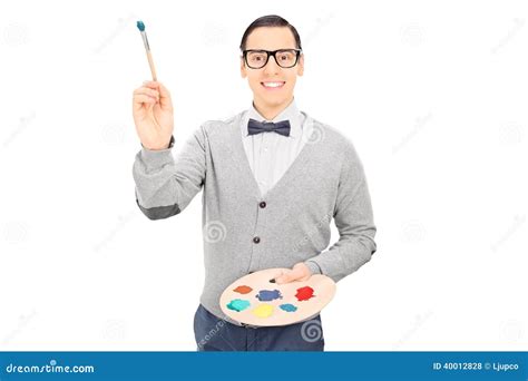 Male Artist Holding Paintbrush And A Color Pallet Stock Photo Image