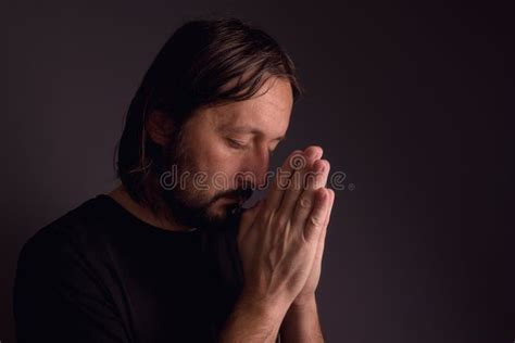 Adult Bearded Man Praying In Dark Room Stock Photo Image Of Religion