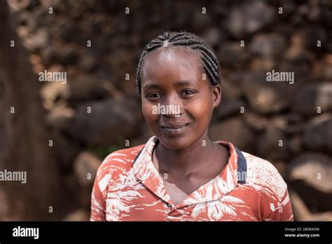 A Young Woman Pauses Her Daily Activities Member Of The Konso Ethnic Group Or Tribe Gamole