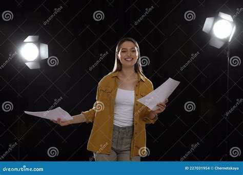 Professional Actress Reading Her Script During Rehearsal In Theatre