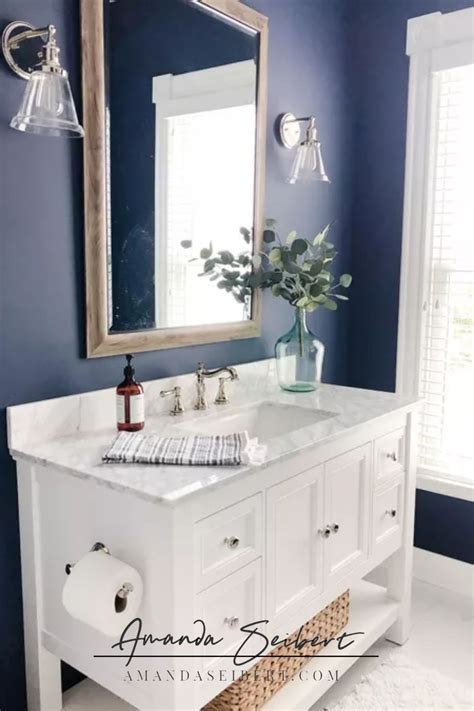 Bath Remodel with Navy Blue Walls and White Vanity | Blue bathroom ...