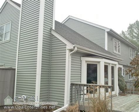 Bay Patio Door And Alside Centerlock Vinyl Siding With White Trim Traditional House Exterior