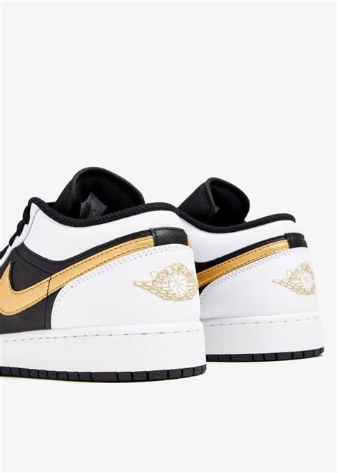 Nike Air Jordan 1 ' White/Metallic Gold' sneakers for Unisex - Black in ...