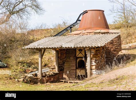 Traditional wood fired lime kiln for production of slaked lime. Working ...