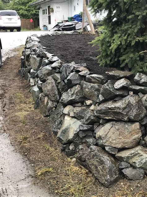 Boulder Retaining Wall - Triton Landscaping